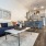 a living room with a blue couch
