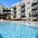 a swimming pool in front of a building