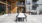 a table and chairs outside a building