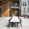 a table and chairs outside a building
