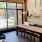 a kitchen with a table and chairs