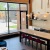 a kitchen with a table and chairs