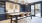 a kitchen with a table and chairs