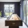 a room with a fireplace and a table